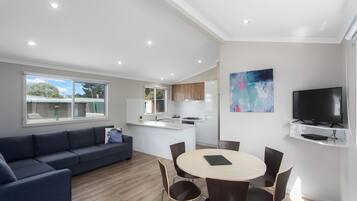 Superior 3 Bedroom Cabin | Living area | TV, DVD player