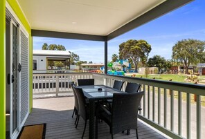 Deluxe Poolside Accessible 2 Bedroom Cabin | Terrace/patio