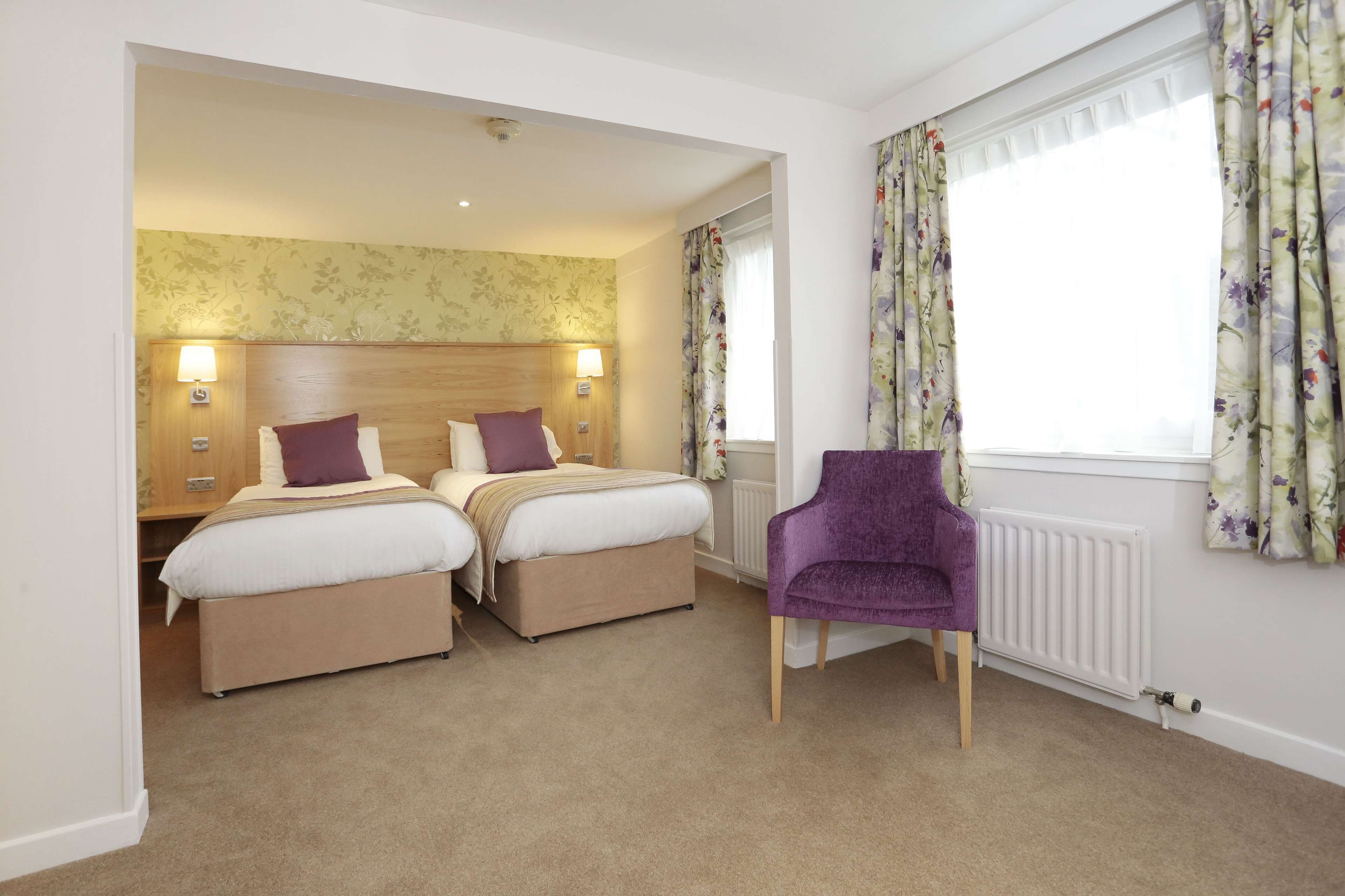 premium bedding, desk, laptop workspace, iron/ironing board