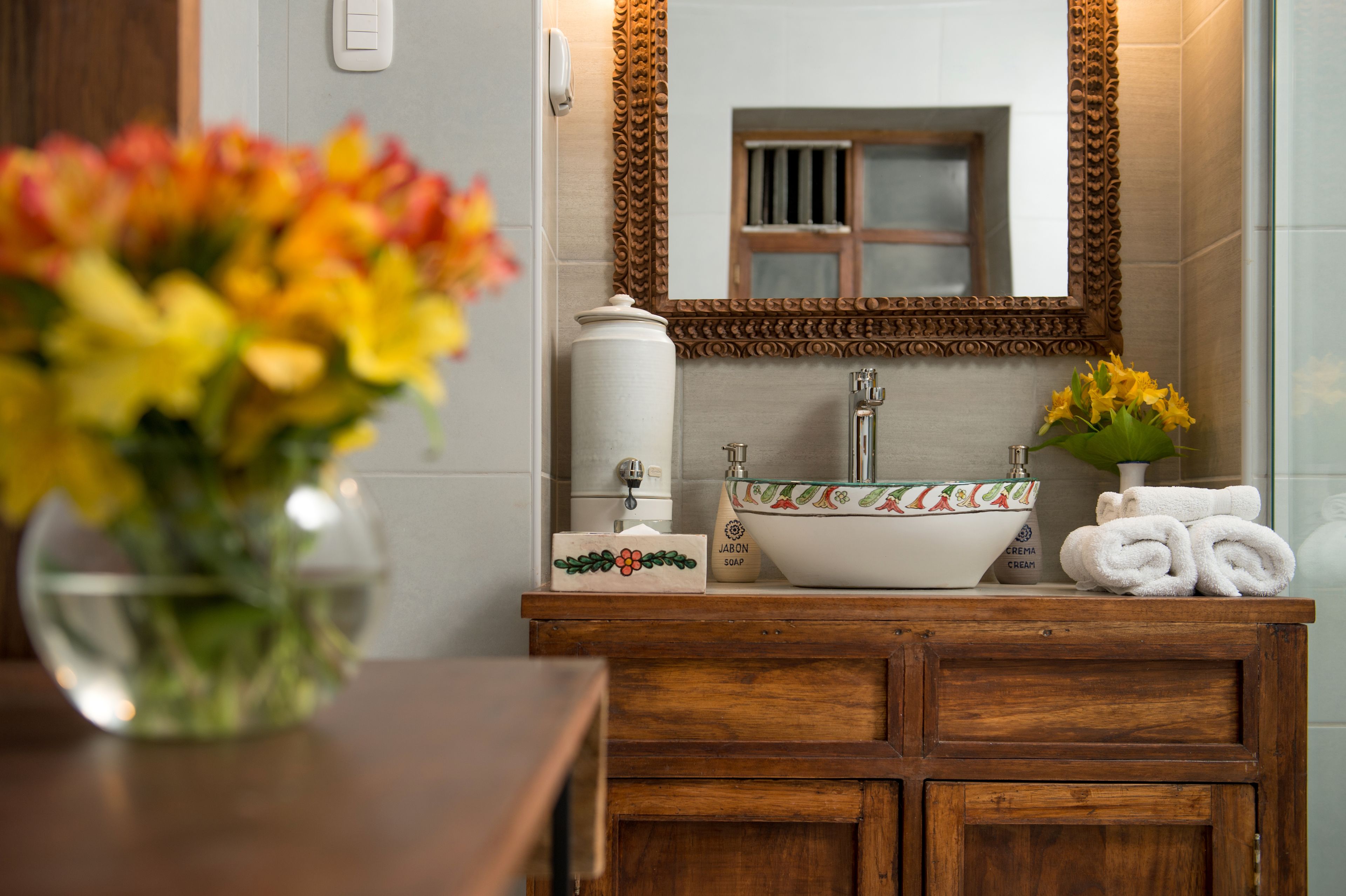 master suite | bathroom | shower, rainfall showerhead, designer toiletries, hair dryer