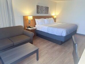 Desk, laptop workspace, blackout curtains, iron/ironing board - Quality Inn & Suites Fort Collins East (Fort Collins)