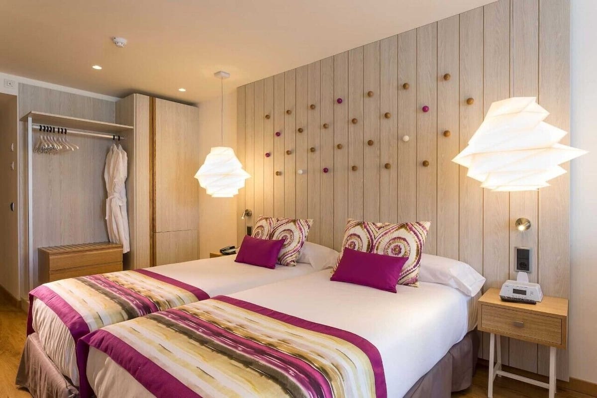Premium bedding, memory foam beds, minibar, in-room safe