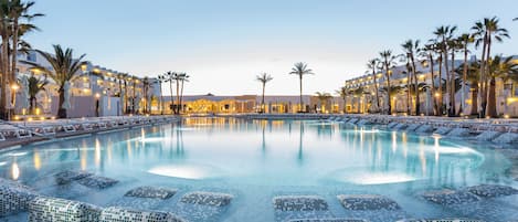 2 outdoor pools, open 10:00 AM to 6:00 PM, pool umbrellas, pool loungers