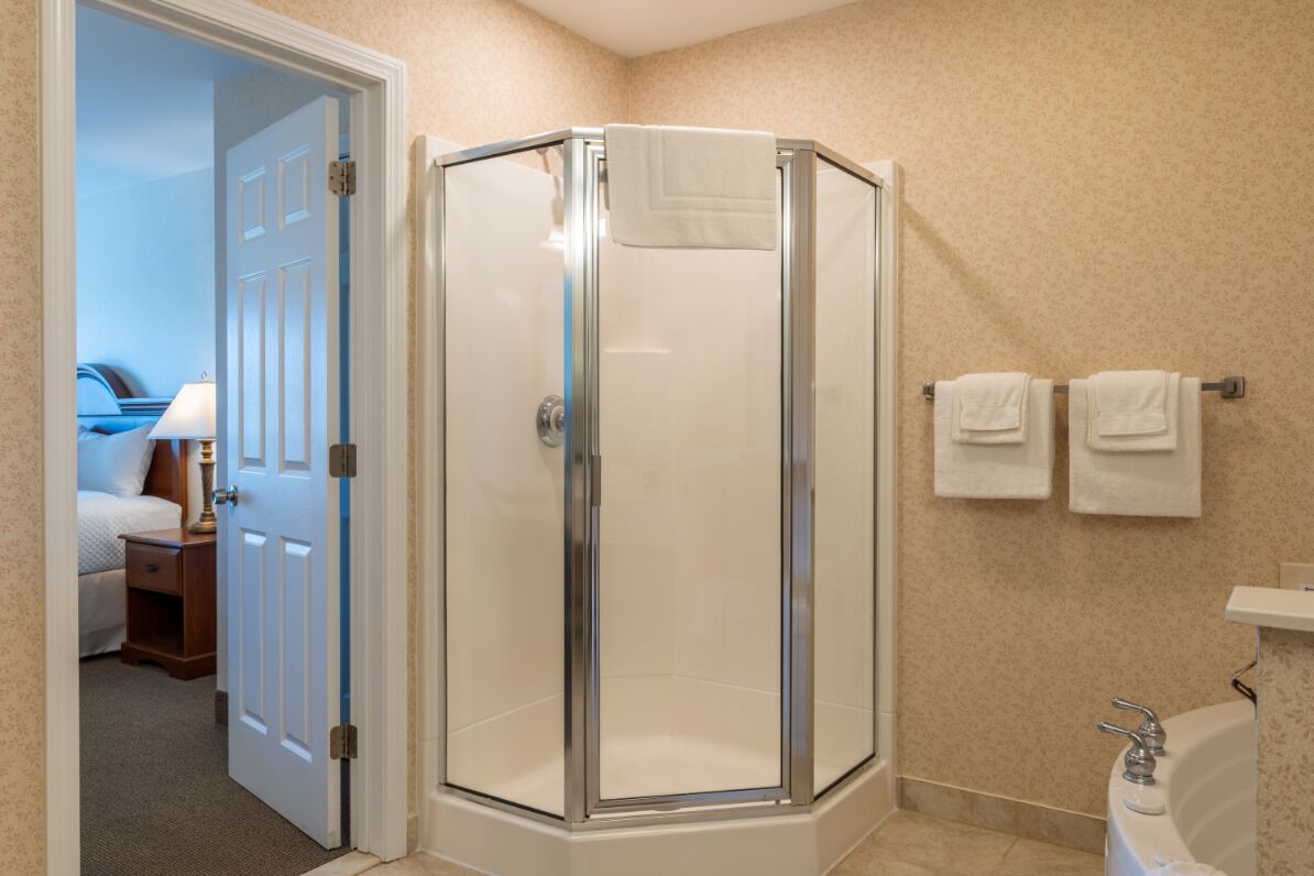 luxury suite, 1 bedroom, kitchenette | bathroom | combined shower/bathtub, hair dryer, towels, soap