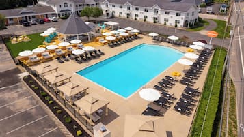Seasonal outdoor pool, open 9:00 AM to 9:00 PM, free cabanas