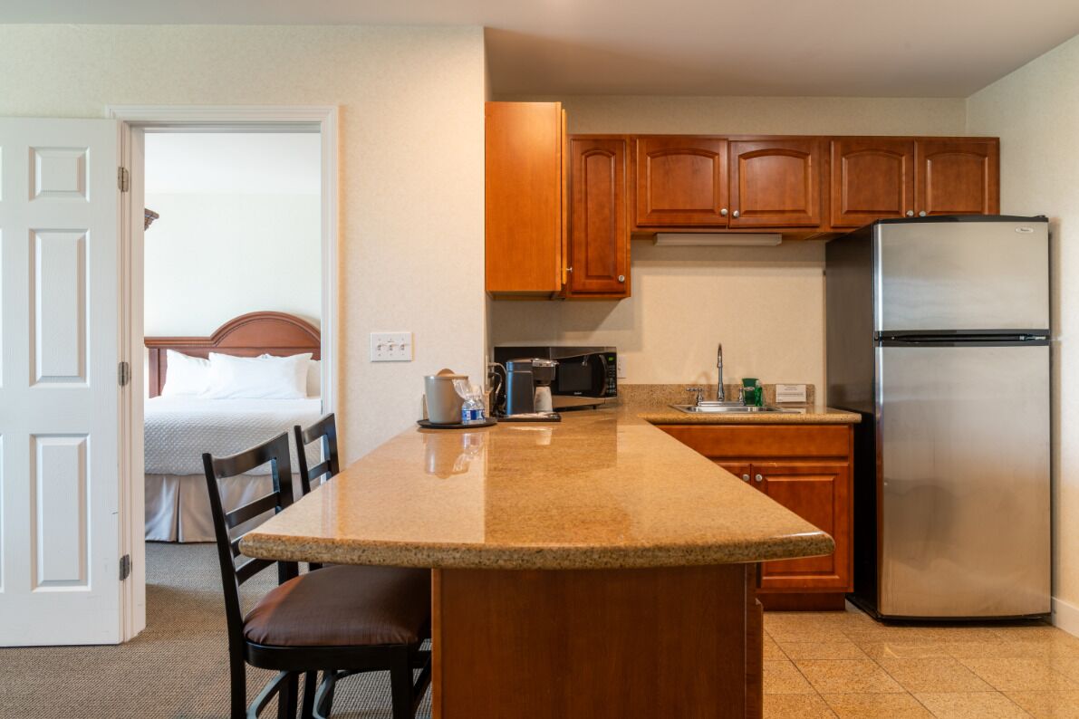 luxury suite, 1 bedroom, kitchenette | private kitchen | fridge