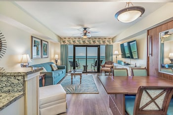 Oceanfront 1 Bedroom Deluxe | Living area | Flat-screen TV at Island Vista Resort