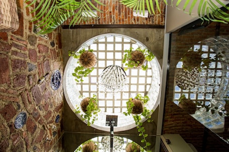 Premium Suite, 1 King Bed, Air conditioning, Pool View (Premium Poolside Suite) | Bathroom | Designer toiletries, hair dryer, towels, soap