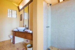 Suite, 1 King Bed, Partial Sea View | Bathroom | Shower, towels - Hostal Vallarta Suites (Puerto Vallarta)