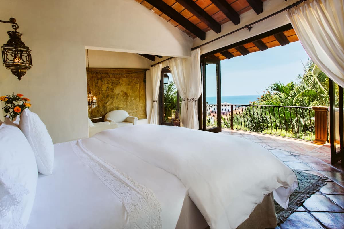 signature suite angel's view, 1 king bed, terrace, ocean view | 1 bedroom, premium bedding, in-room safe, individually decorated