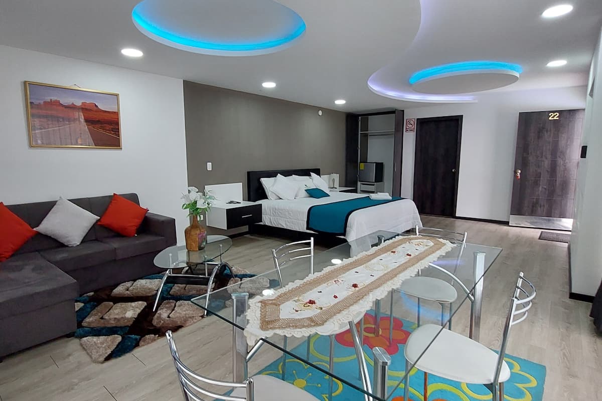 superior suite, hot tub | in-room safe, soundproofing, iron/ironing board, free wifi