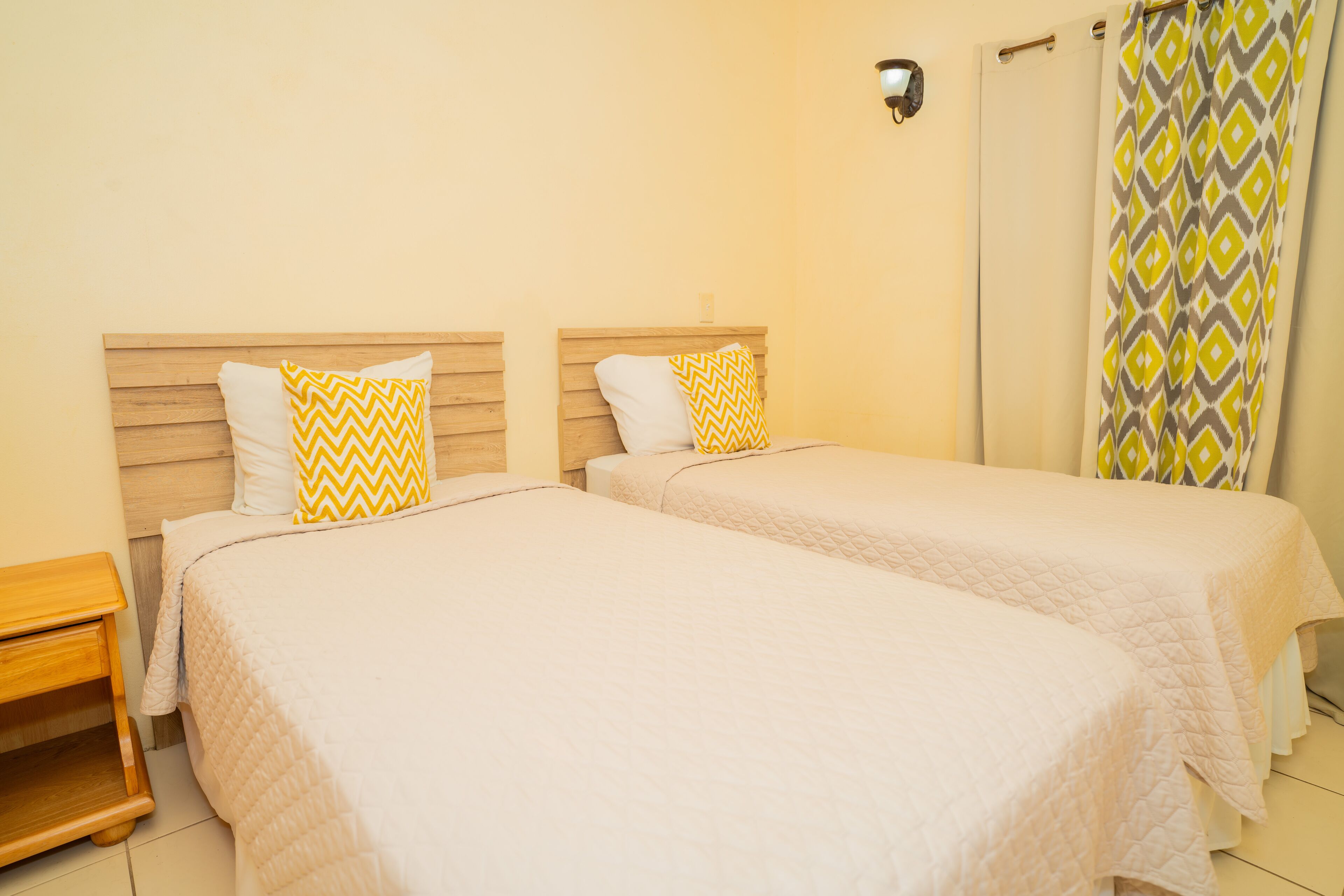 economy room, 2 single beds, ground floor | 1 bedroom, individually decorated, iron/ironing board, free wifi