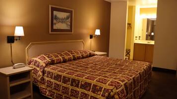 Room, 1 King Bed, Non Smoking | Blackout drapes, bed sheets