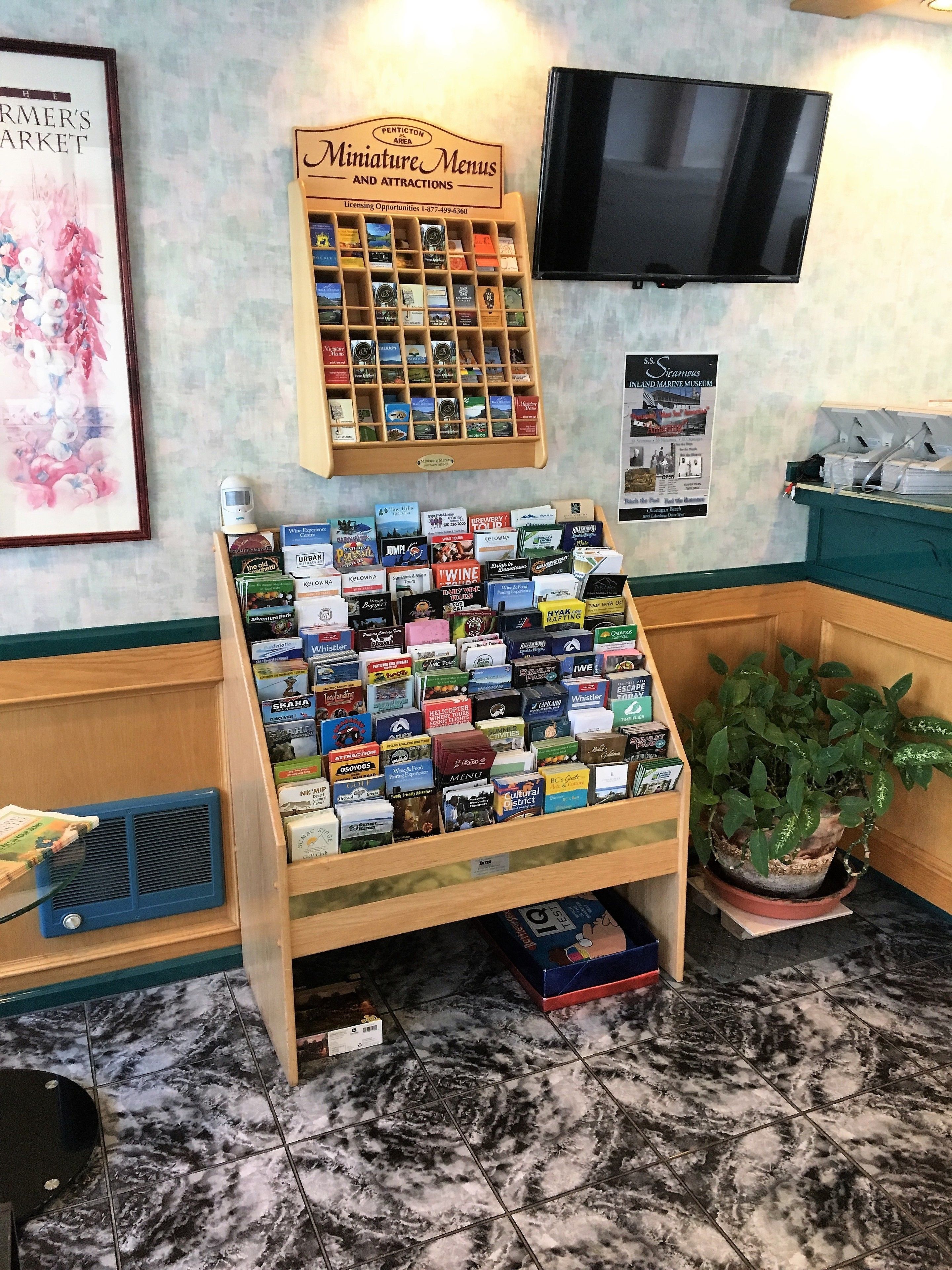 A display of miniature menus and attractions at a hotel.