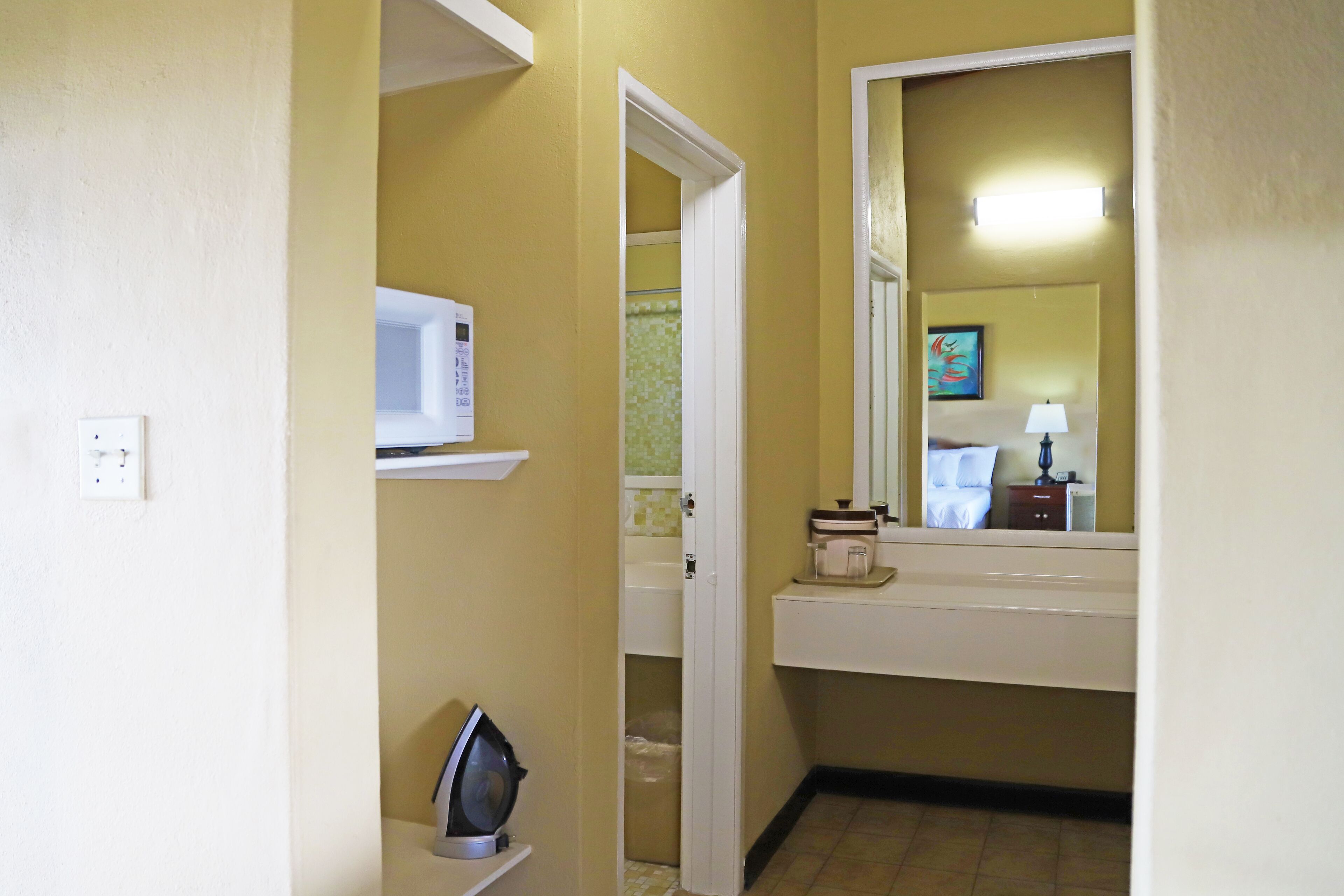 deluxe studio with patio | 1 bedroom, individually furnished, desk, iron/ironing board