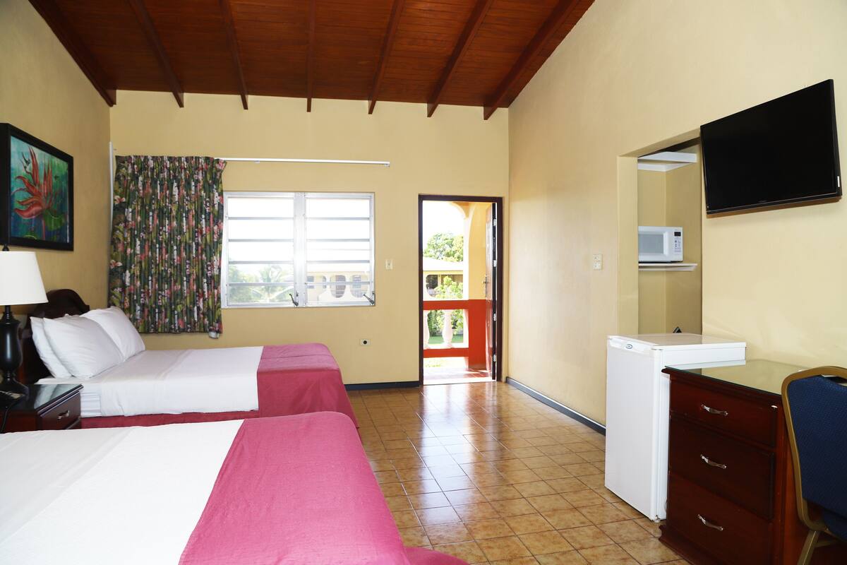 deluxe studio with patio | 1 bedroom, individually furnished, desk, iron/ironing board