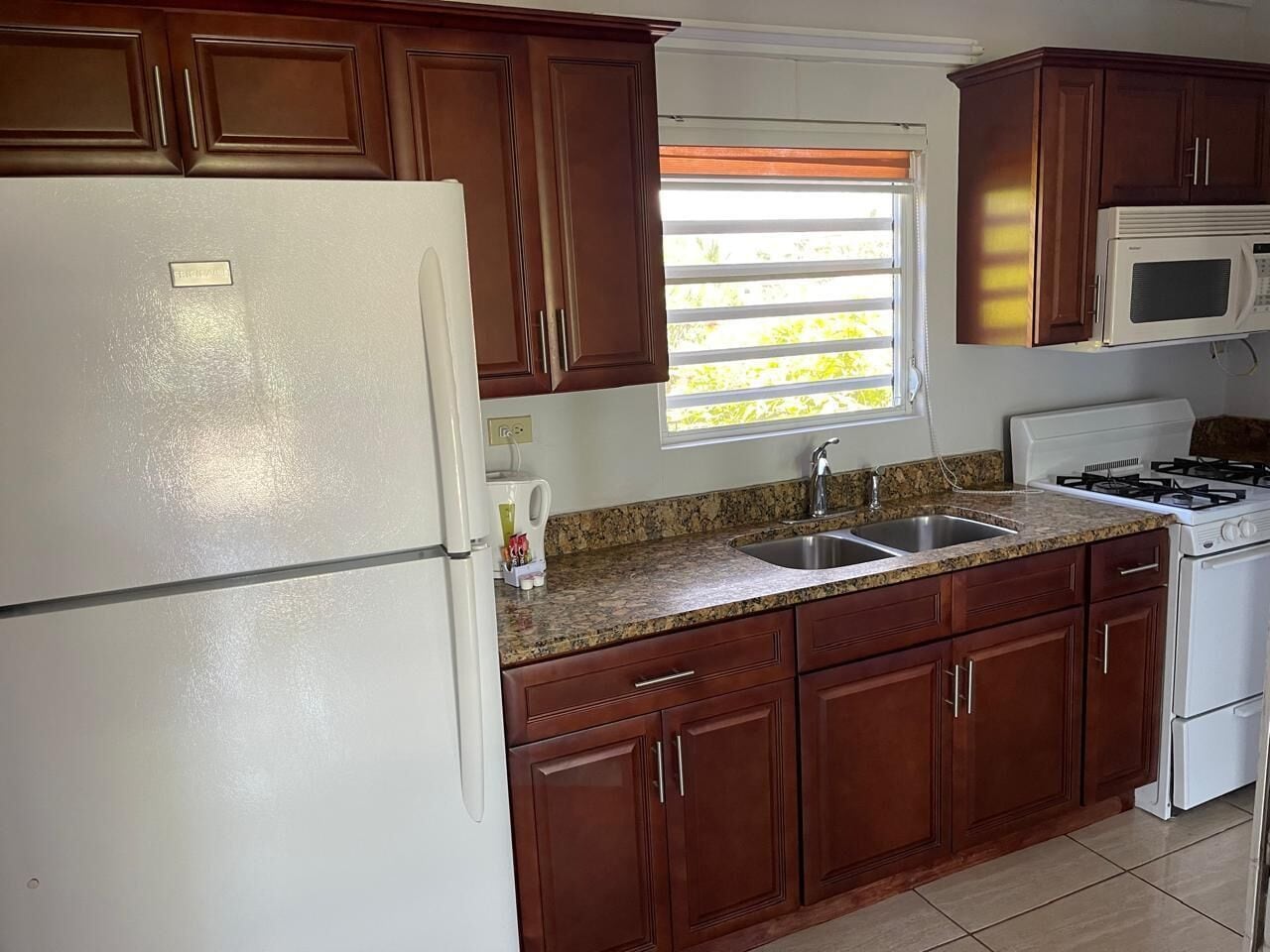 one bedroom with full kitchen | private kitchen | full-sized fridge, microwave, oven, electric kettle