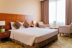 Deluxe Single | Minibar, safe på rommet, individuelt dekorert og individuelt innredet