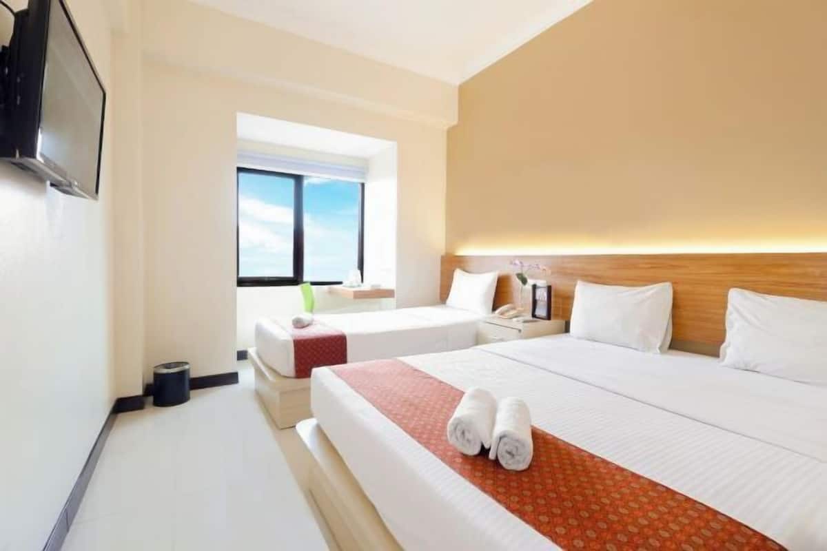 Escritorio, cortinas blackout, wifi gratis y ropa de cama