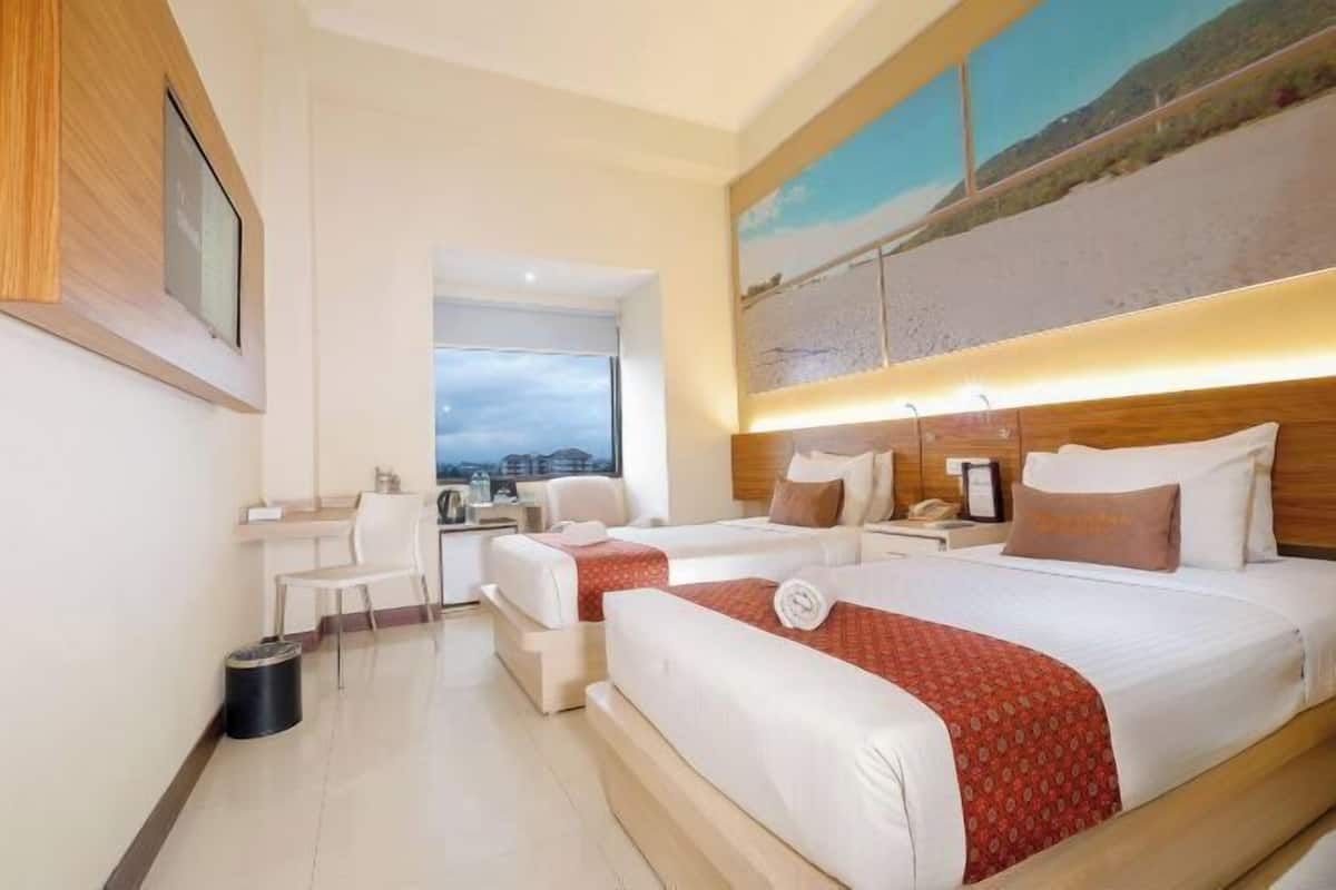 Escritorio, cortinas opacas, wifi gratis y ropa de cama