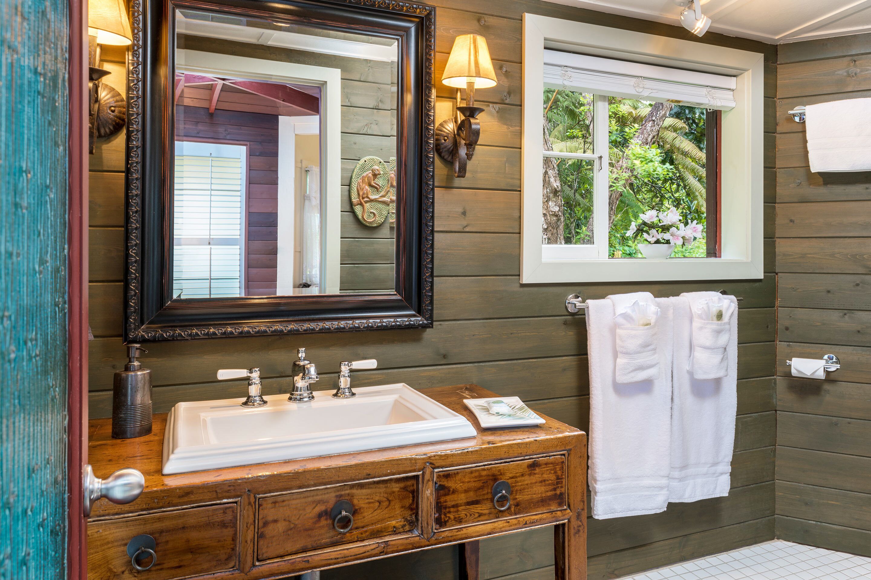 private rainforest cottage (umauma fall) | bathroom | hair dryer, bathrobes, towels