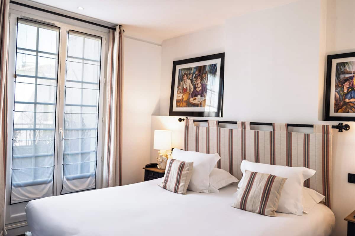 premium double room, 1 king bed | premium bedding, minibar, individually decorated, individually furnished