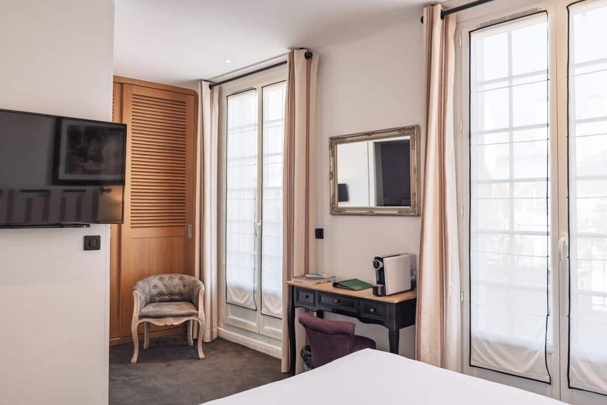 premium double room, 1 king bed | premium bedding, minibar, individually decorated, individually furnished