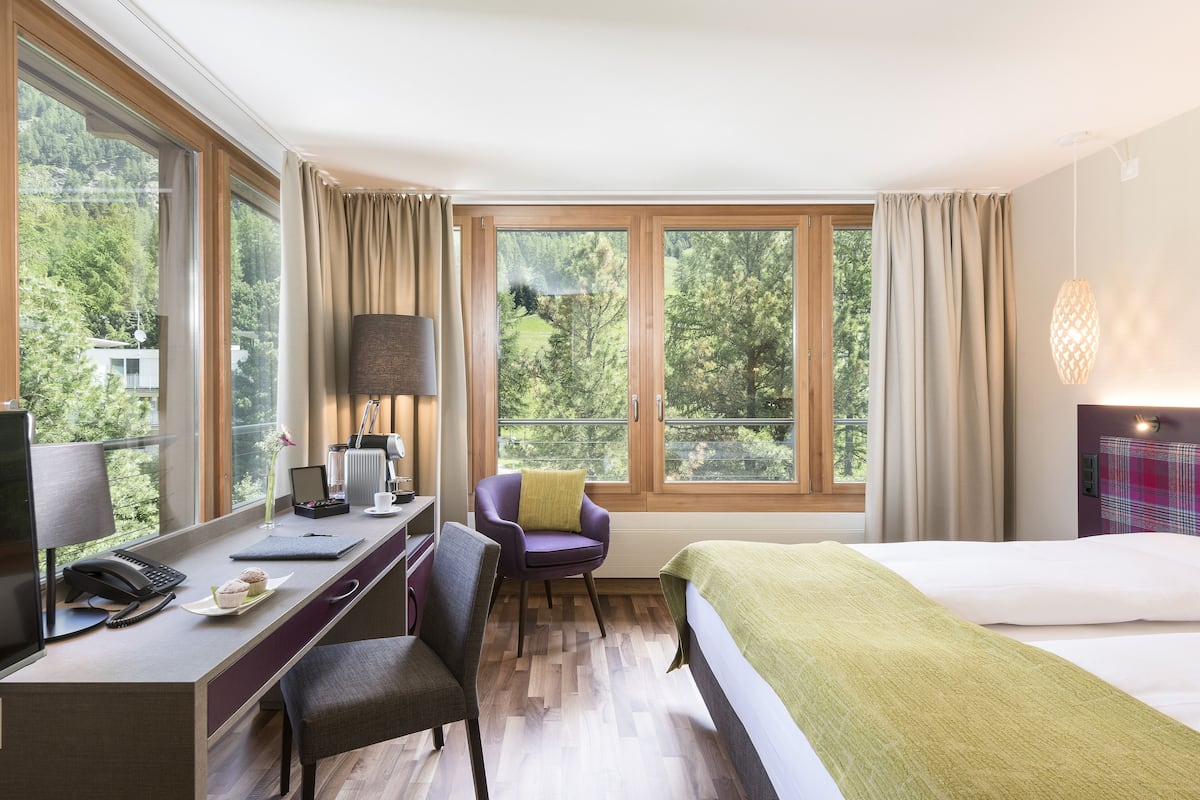 standard double room, 1 double bed, mountain view, mountainside | premium bedding, in-room safe, desk, soundproofing