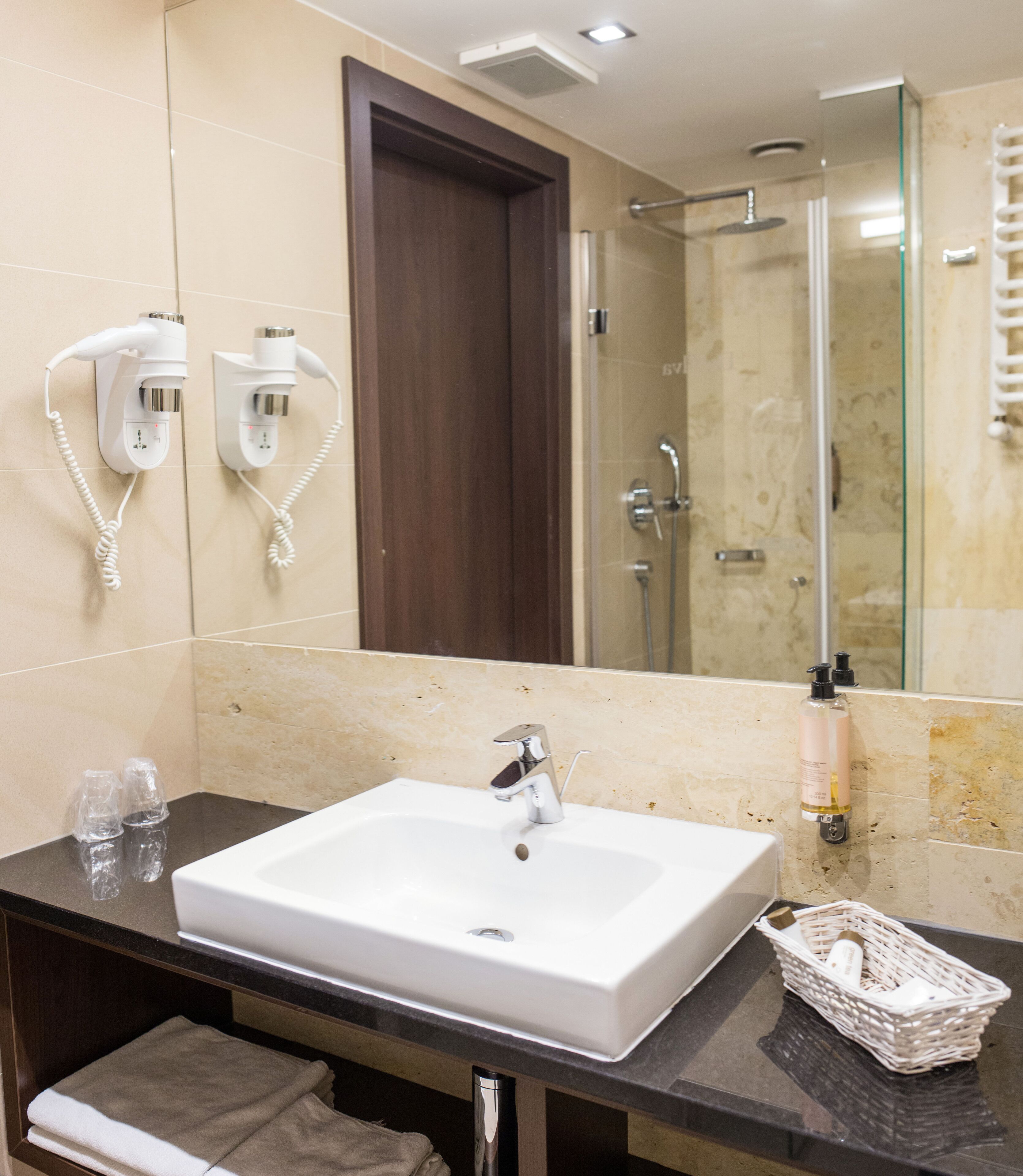 shower, free toiletries, hair dryer, towels