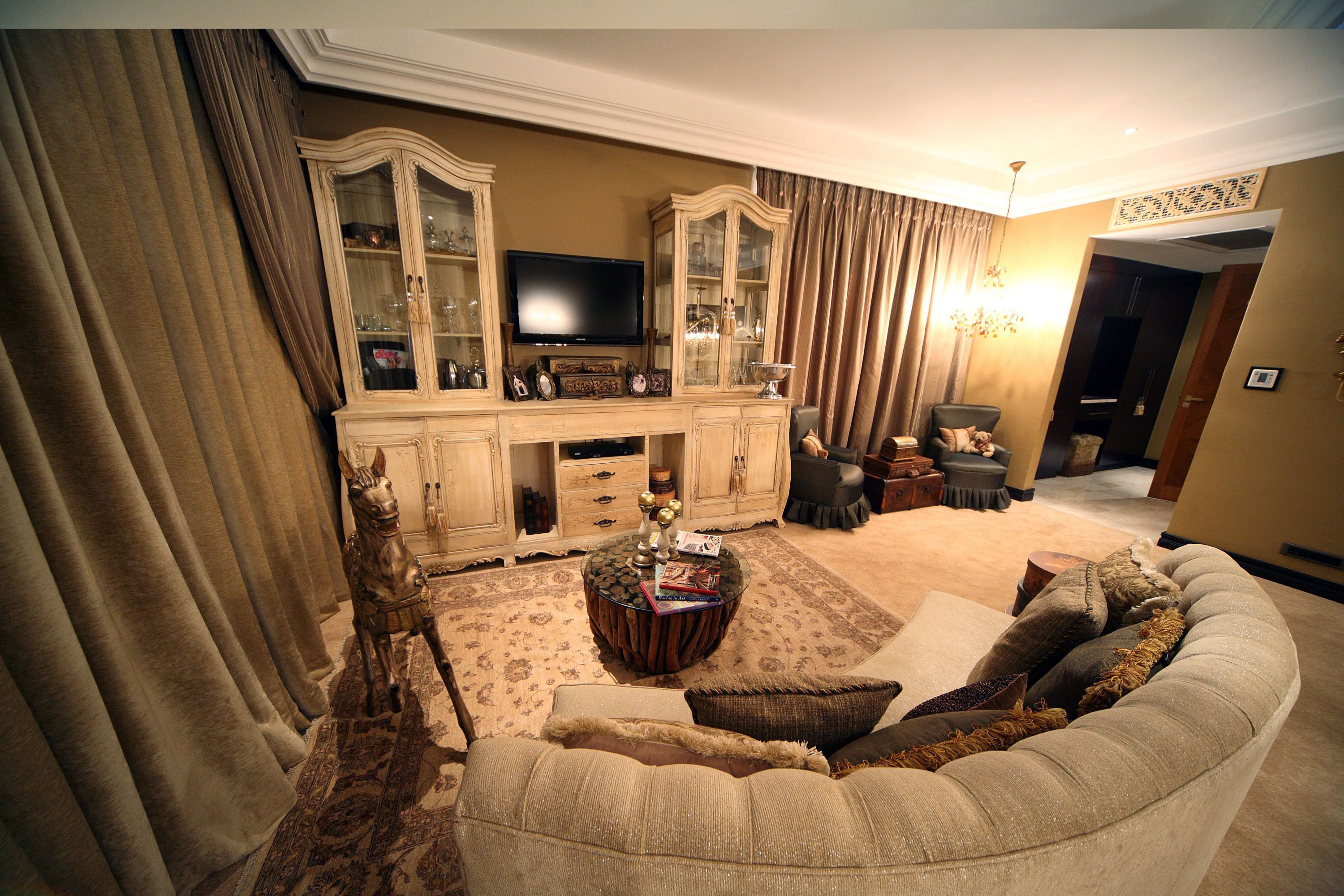 executive suite | living room | 32-inch flat-screen tv with satellite channels, tv, dvd player