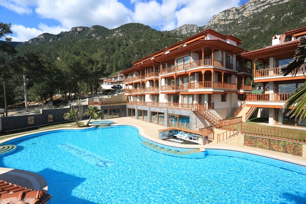 Outdoor pool, pool umbrellas, pool loungers