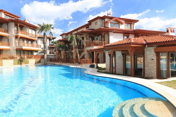 Outdoor pool, pool umbrellas, pool loungers