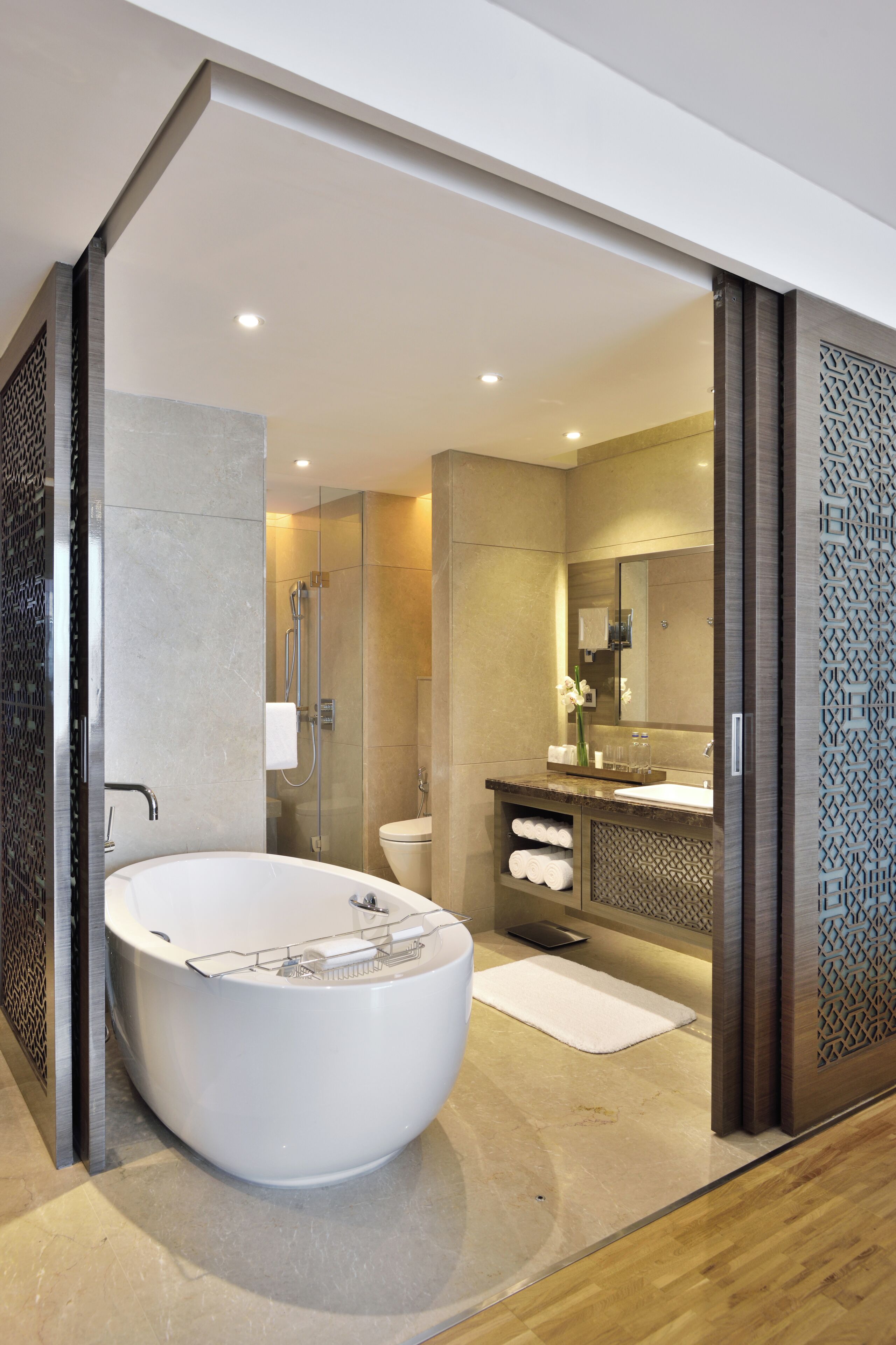 separate bathtub and shower, designer toiletries, hair dryer, bathrobes