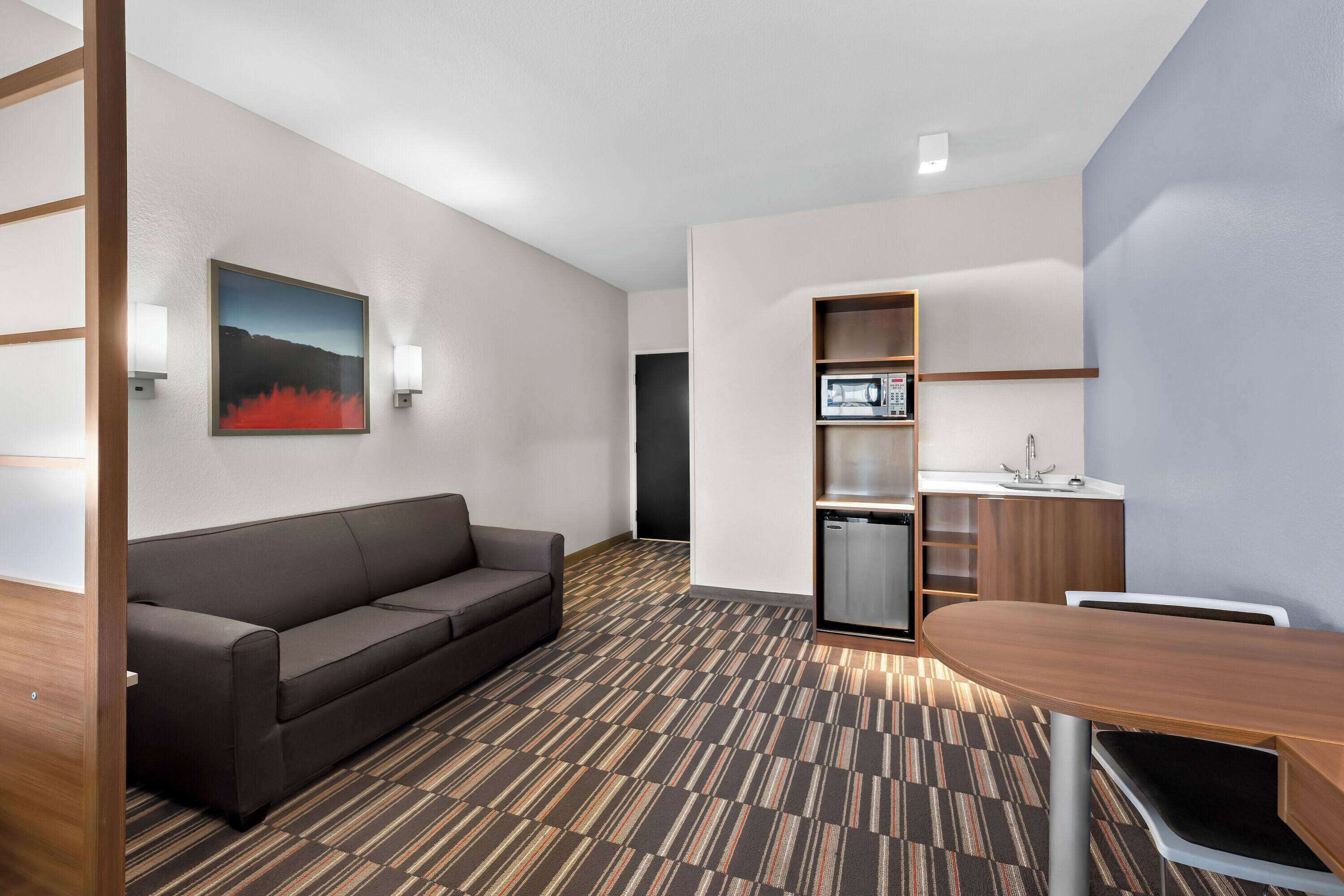 studio suite, 1 king bed, non smoking | desk, laptop workspace, blackout curtains, iron/ironing board