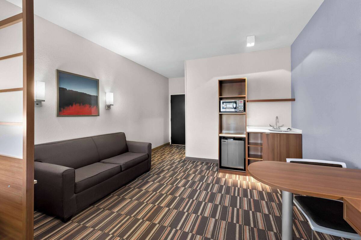 studio suite, 1 king bed, non smoking | desk, laptop workspace, blackout curtains, iron/ironing board