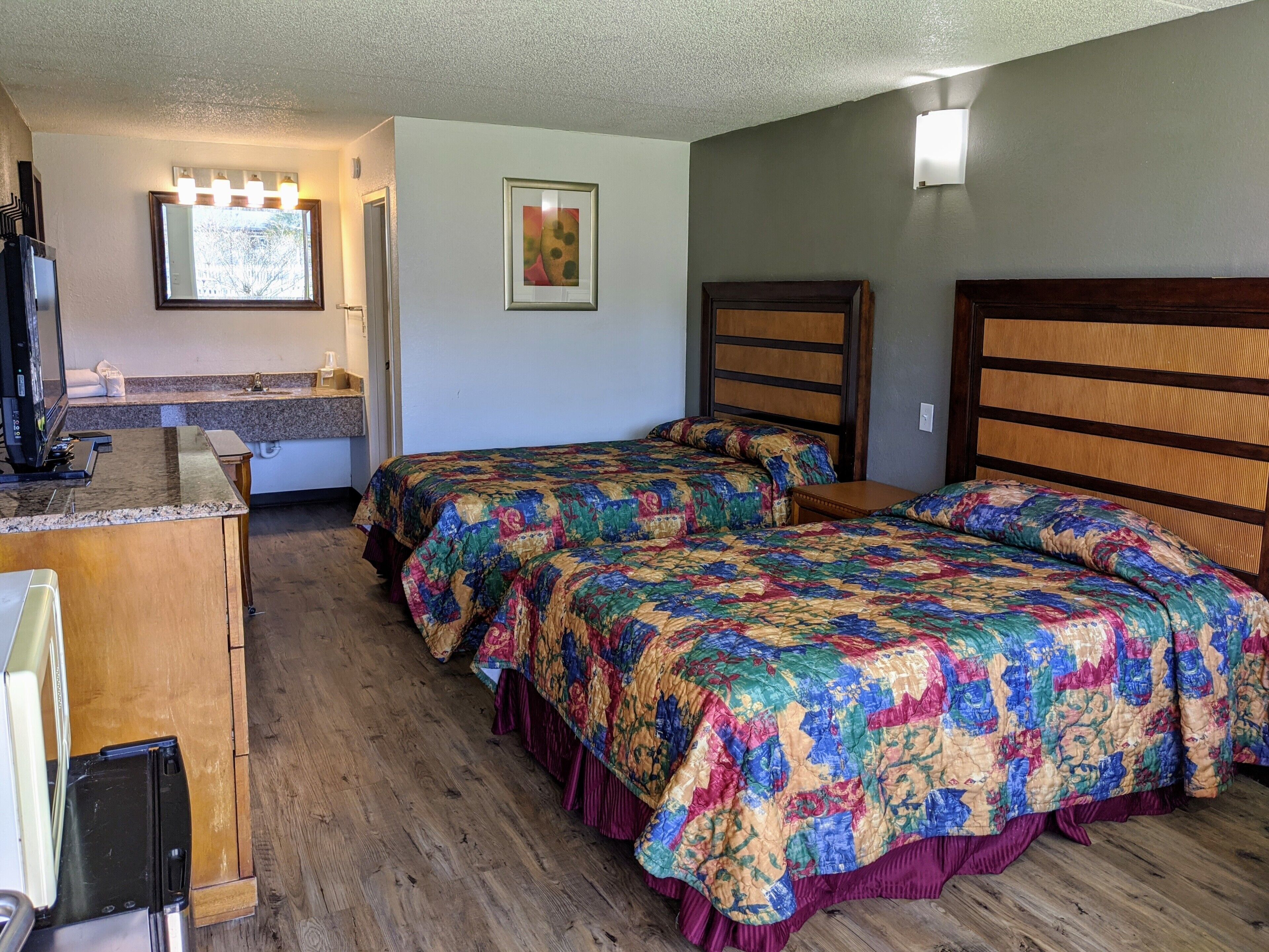 Photo - Garden Inn & Suites