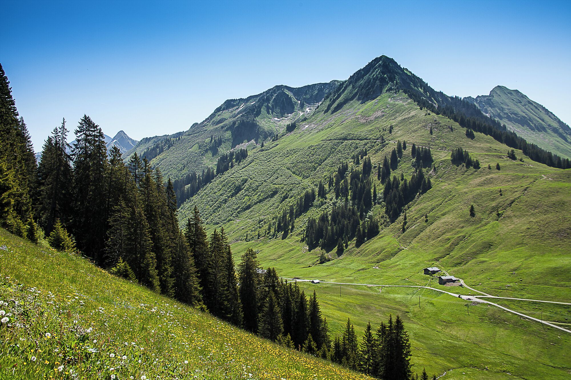 A mountainous landscape with a clear sky.