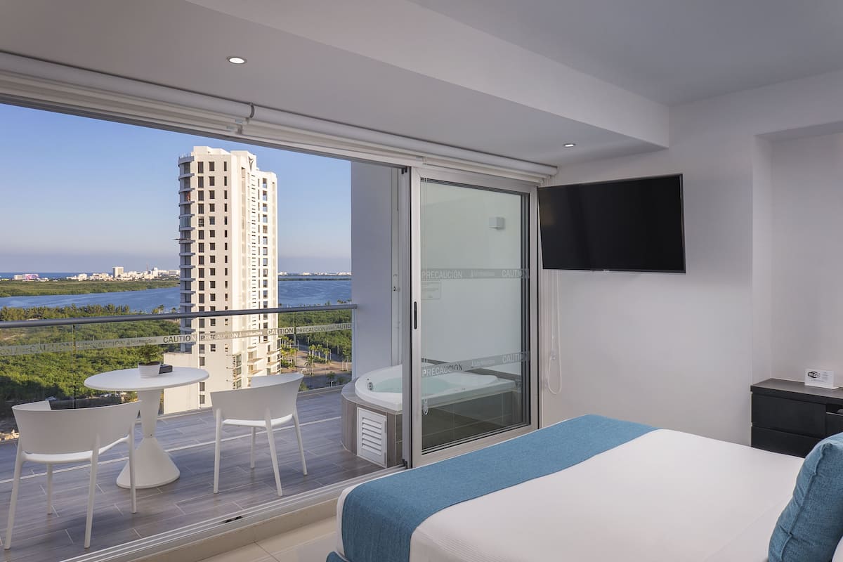 luxury room, 1 king bed, hot tub, sea view | television