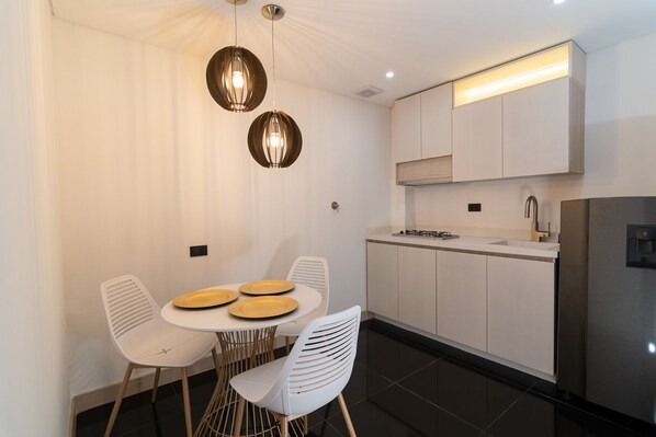 Family Apartment | Living area | Flat-screen TV - Hotel Zona A (Medellín)