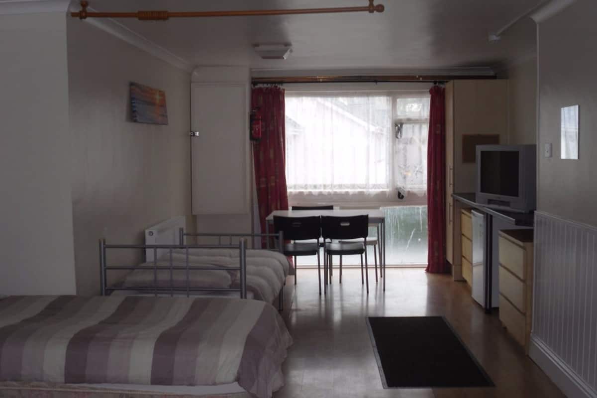 Standard Triple Room, Shared Bathroom | Desk, iron/ironing board (on request), WiFi (free)