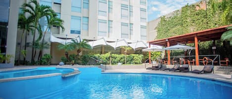 2 outdoor pools, pool umbrellas, pool loungers