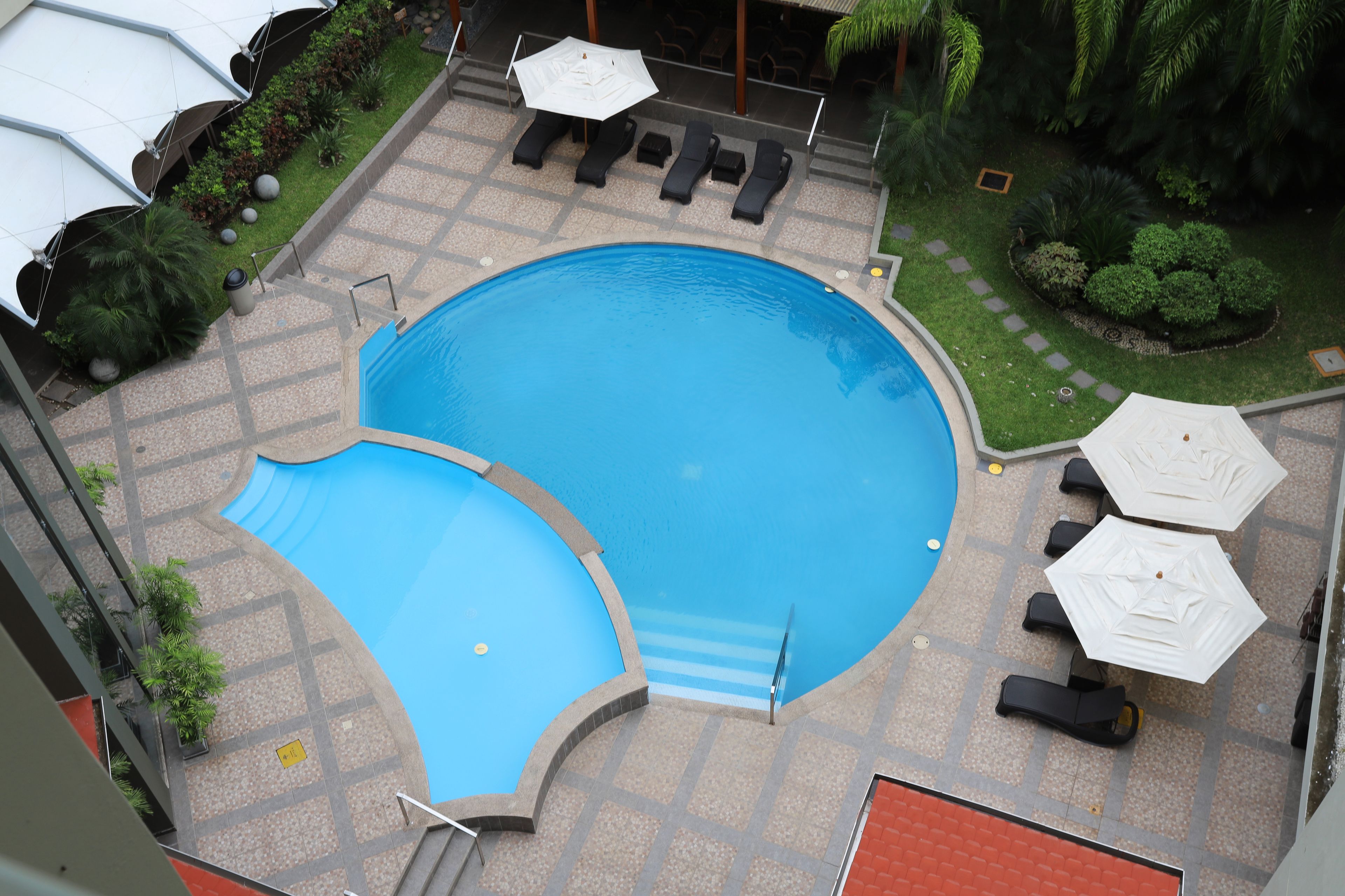 2 outdoor pools, pool umbrellas, pool loungers
