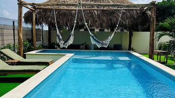 Outdoor pool, pool umbrellas, sun loungers