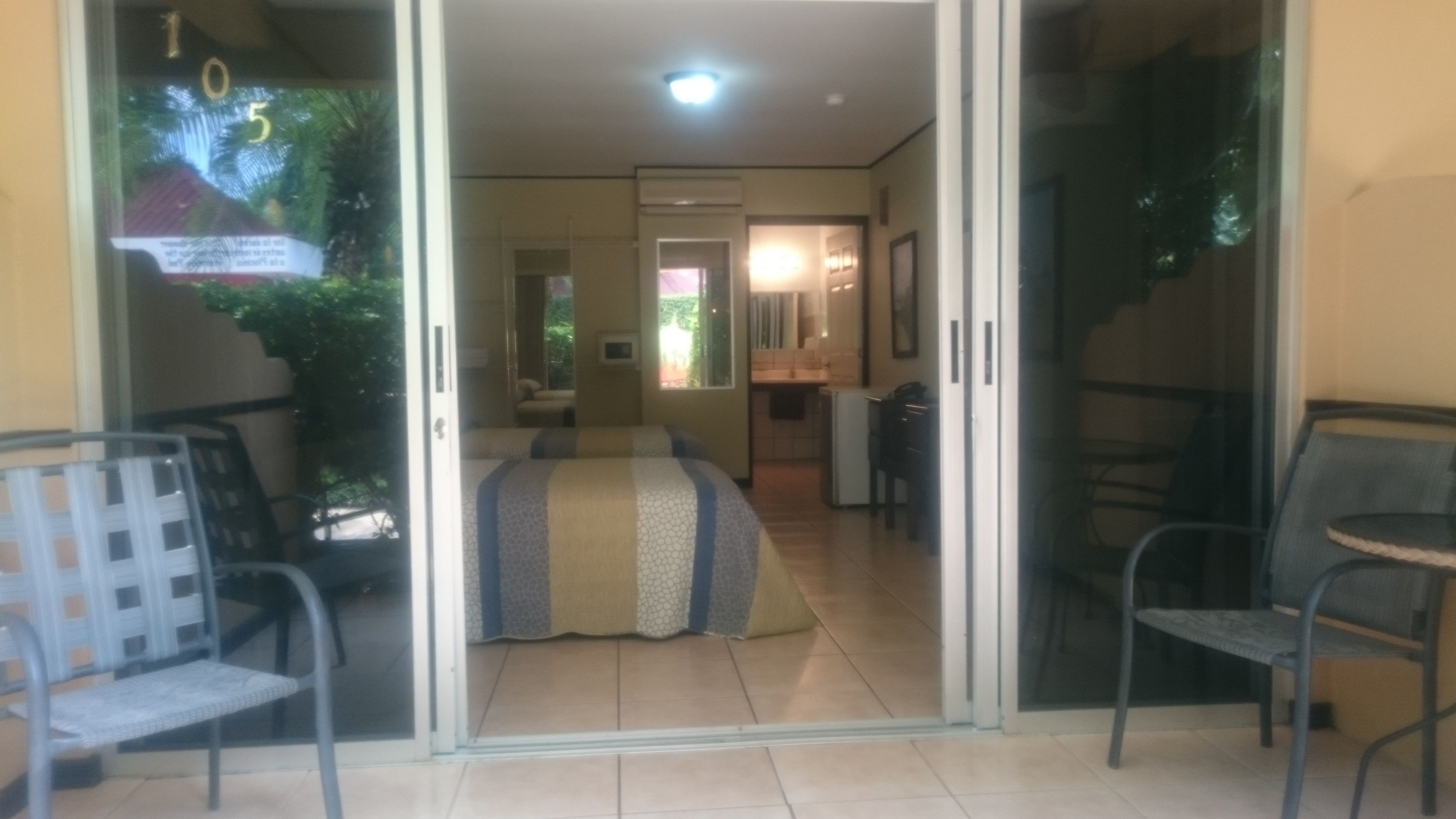 standard room, 2 double beds, pool view | premium bedding, in-room safe, rollaway beds, free wifi