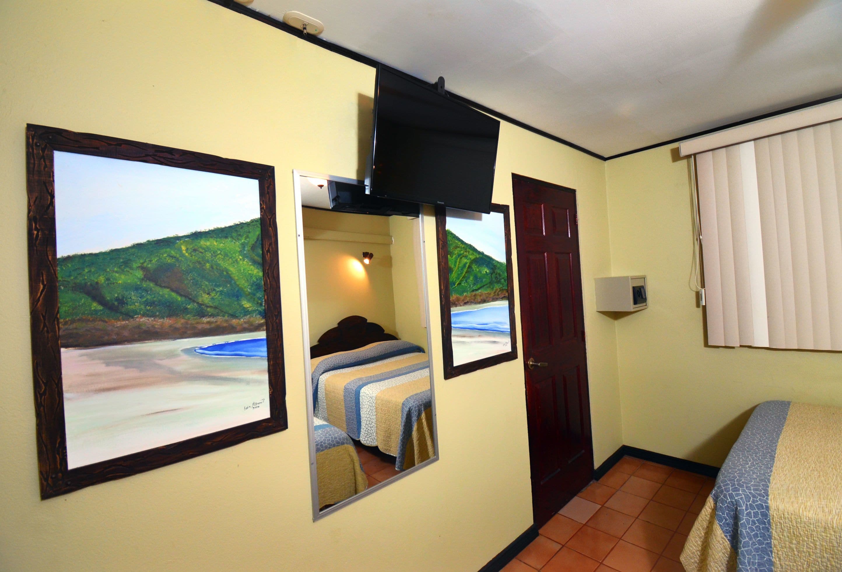 standard room, 2 double beds, pool view | premium bedding, in-room safe, rollaway beds, free wifi