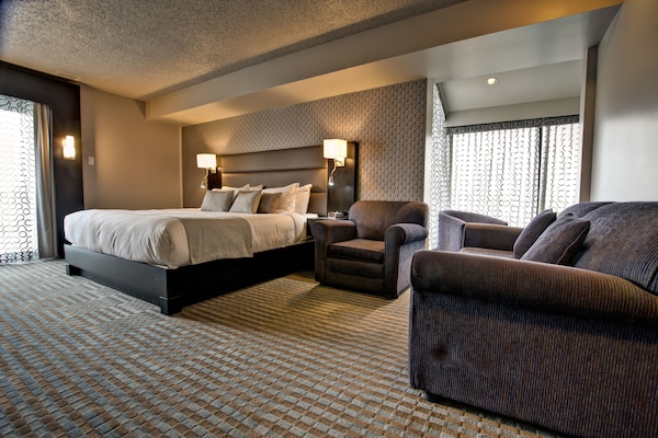 Deluxe Room, 1 King Bed with Sofa bed | Living area | 43-inch flat-screen TV with cable channels, TV, DVD player