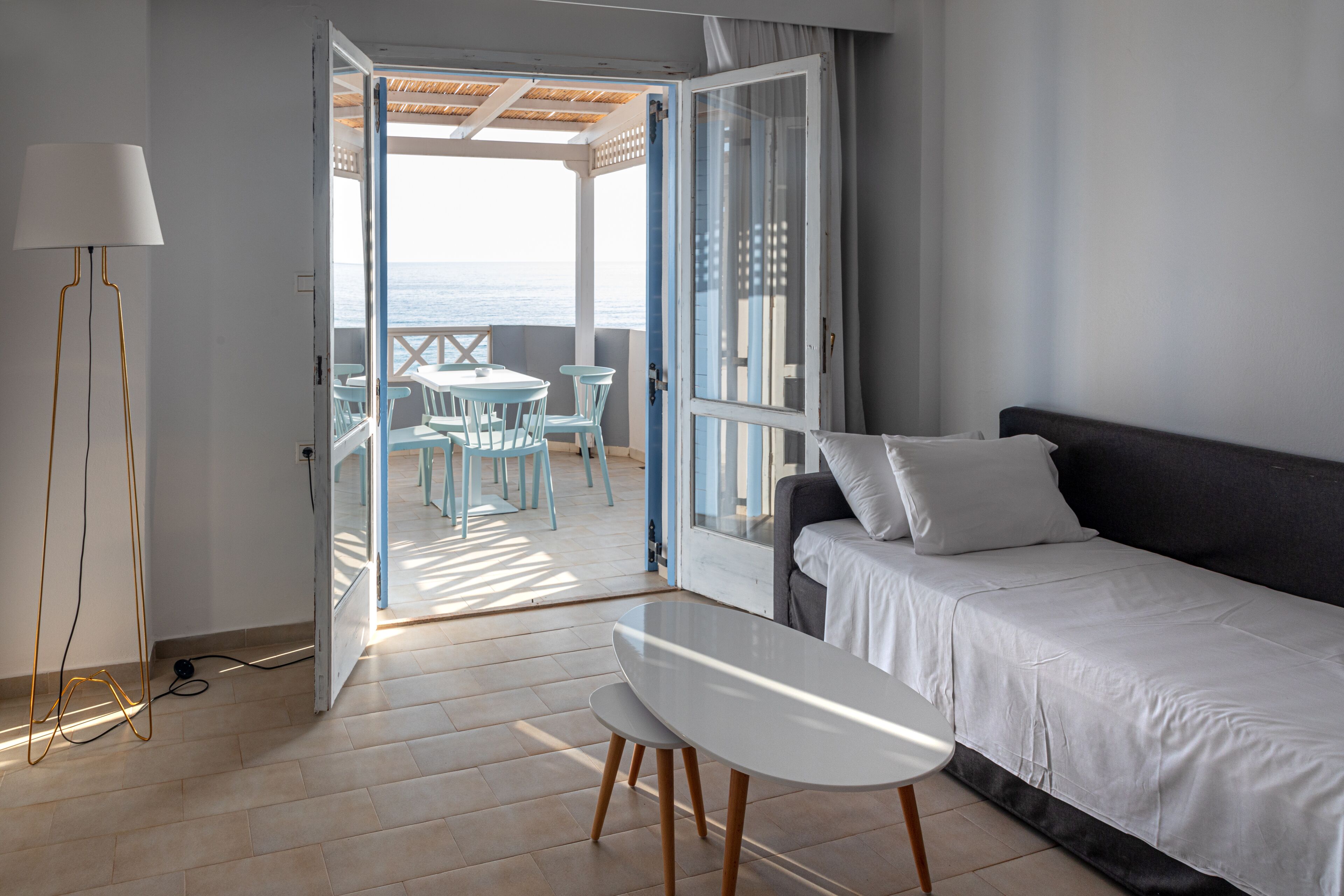 Exclusive Quadruple Room, Sea View | In-room safe, free cribs/infant beds, bed sheets