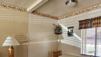 Deluxe Room, 1 King Bed | Individually decorated, iron/ironing board, free WiFi, bed sheets