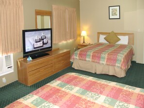 Standard Room, 2 Queen Beds | Desk, iron/ironing board, free WiFi, bed sheets