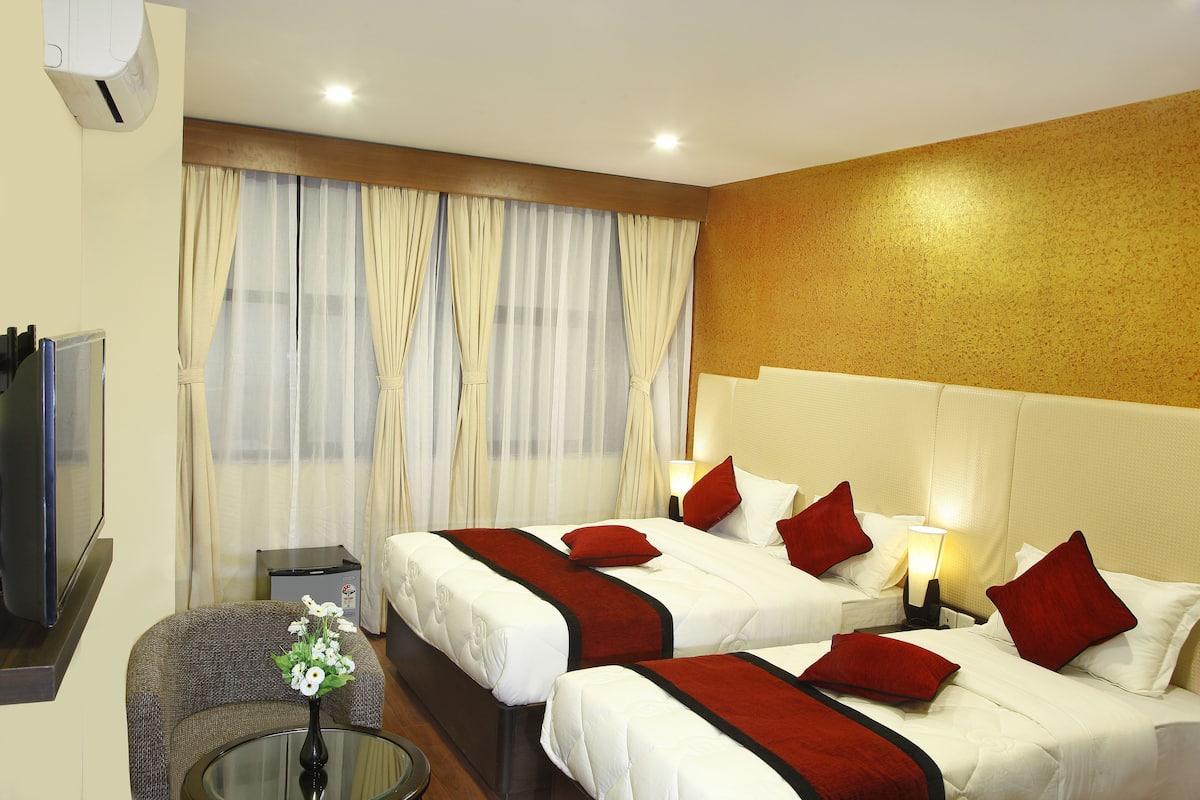 Chambre Triple, plusieurs lits, salle de bains privée